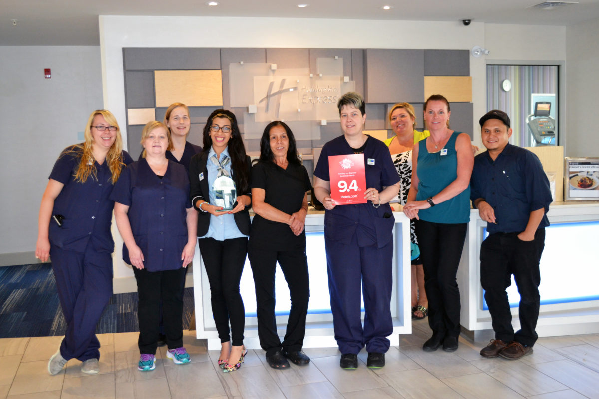 Holiday Inn Express Red Deer North Staff Celebrating the IHG Winning Metrics Award